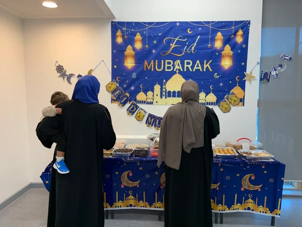 Preparing the hall for an Eid celebration