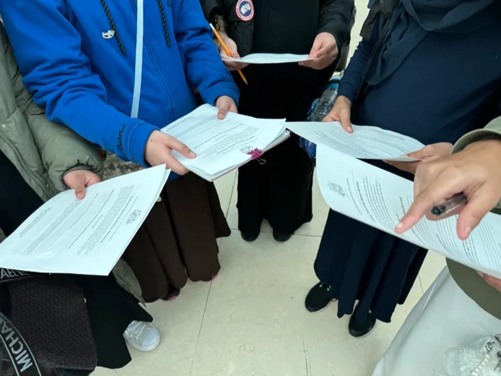 Worksheets being handed out at an in-person workshop